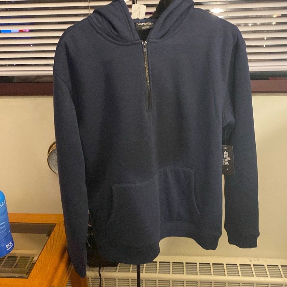 This is a brand new sweat, jacket with hood and zipper from stitch fix size 18